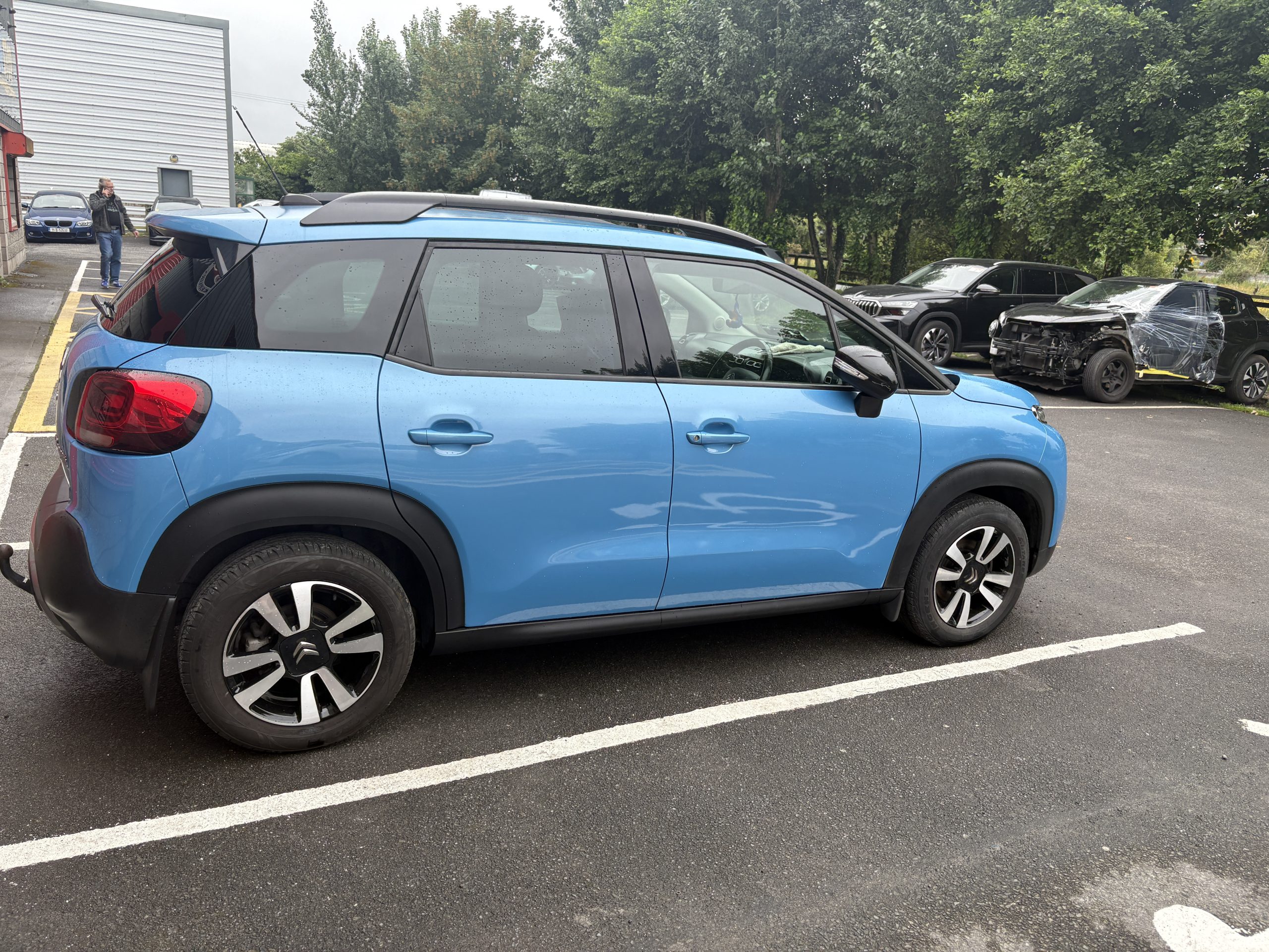 Blue Citroen C3 side view showing restored doors.